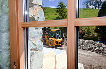 Triple glazed windows in old farmhouse refurbished to be as environmentally friendly as possible. Grayrigg, Cumbria, England, UK, April 2012.
