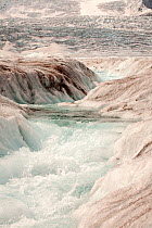 Meltwater channels on the Athabasca glacier which has lost 60 percent of its ice in the last 150 years. Rocky Mountains, Alberta, Canada. August 2012.