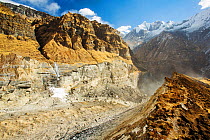 U shaped valley caused by rapidly retreating South Annapurna glacier in the Annapurna sanctuary, Nepalese Himalayas, Nepal. December 2012.