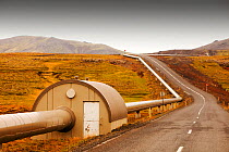 A pipeline taking geothermally heated hot water from Hellisheidi geothermal power station in Hengill, to Reykjavik, Iceland. September 2010.