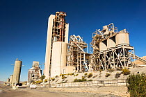 A cement works at Tehachapi Pass California, USA, Cement production is one of the most carbon hungry industries on the planet. September 2014.