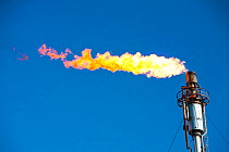 Flaring off gas at the Flotta oil terminal on the Island of Flotta in the Orkney's Scotland, UK.  October 2011.