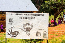 School feeding program sign at a school on the Zomba Plateau, in a country where malnutrition is common, this World Food Program provides additional food to infant school pupils is very important.