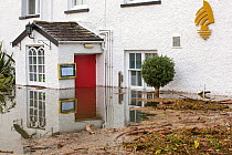 The Wateredge Inn surrounded by flood water after Lake Windermere burst its banks in Ambleside in the Lake District on Sunday 6th December 2015, after torrential rain from storm Desmond. England, UK,...