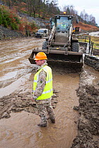 The Army helping to clear A591 after flooding caused major damage during Storm Desmond, Cumbria, England, UK, 3th December 2015.