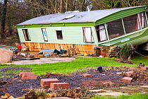 Caravan park on the banks of the River Greta damaged by floods from Storm Desmond, Cumbria, England, UK, 6th January 2016.