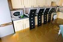 Interior view of house during flooding, Toll Bar near Doncaster, South Yorkshire, England, UK, July 2007.