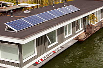 Floating house bed and breakfast with solar panels, Amsterdam, Netherlands, April 2013.