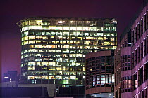 Office blocks burning energy with lights on at night,  in London, England, UK. September 2005.