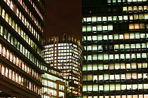 Office blocks burning energy with lights on at night,  in London, England, UK. September 2005.