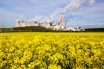Ratcliffe on Soar, a massive coal powered power station in Nottinghamshire, with field of oilseed rape in foreground, UK, May 2008.