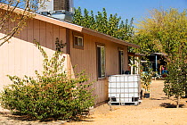 Water tank supplied by a water charity in Porterville. The charity  supplies water to houses who have had no running water for over five months during the 2012-2017 drought near Bakersfield, Californi...