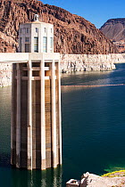 Intake towers for the hydro plant on the Hoover Dam, Lake Mead, Nevada, USA. The lake is at a very low level due to the four year long drought. September 2014.