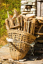Firewood in basket, Annapurna, Himalayas. Nepal, December 2012.