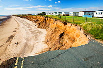 Collapsed coastal road at between Skipsea and Ulrome, Yorkshire, England, UK. August 2013.