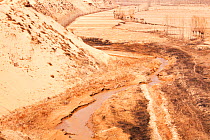 Very low water levels in river during severe drought,  Shanxi province, China, March 2009.
