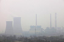 Smog  over coal fired power plants, Shanxi Province, China. March 2009. In 2008 China officially became the worlds largest emitter of greenhouse gases.