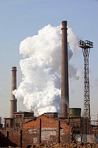 Hangdang Steel works, with billow of vapor, Hangdang, Northern China. March 2009.