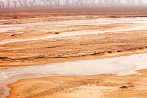 River during drought, Heilingjong province. China. March 2009.