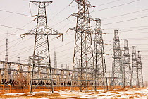 Electricity pylons, in China.  In 2008 China officially became the worlds largest emitter of greenhouse gases, Northern china. March 2009.