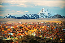 Peak of Huayna Potosi from El Alto above, La Paz, Bolivia. La Paz  and El Alto are critically short of water due to climate change causing  glaciers to melt. The glaciers provide water to the town. Oc...