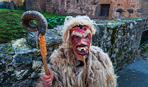 Man in costume at 'La Vijanera' Carnival in Silio. Molledo Municipality,  Cantabria, Spain. January.