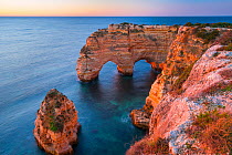 Sea arches on Praia da Marinha beach, Algarve, Portugal, Atlantic Ocean, January.