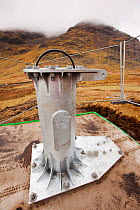 Base section bolted to the foundations in initial groundworks for 3 wind turbines, Kirkstone Pass, Lake District, England, UK.  February 2012.