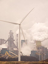 Emissions from a Tata steel works amd wind turbine, Ijmuiden, Netherlands, with a wind turbine. April 2013