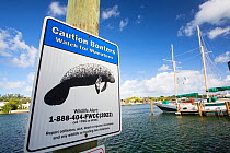 A sign about Manatees in Miami Beach, Florida, USA. October 2015