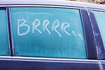 'Brrrrrr' written on a car window in the frost, Ambleside, Cumbria UK. December 2008