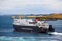 The Caledonian MacBrayne ferry leaving Tarbert on the Isle of Harris, Outer Hebrides, Scotland, UK. June 2015