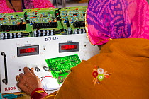 Women on a solar workshop, learning how to make solar lanterns at the Barefoot College, Tilonia, Rajasthan, India. December 2013