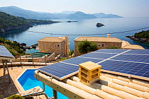 Solar panels on a house roof in Sivota, Greece. June 2014