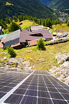 Solar panels attached to a cliff above the Refuge Bertone, which provied electricity to this off grid mountain hut. Tour du Mont Blanc, Alps, Italy. August 2014