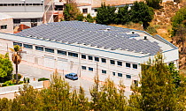 Photovoltaic panels on a roof in Sax, Mercia, Spain. May 2011
