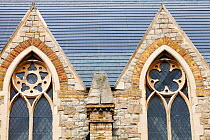 Solar tiles on St Silas's church in Pentonville, London, UK. This new solar roof, produces aprox. 47% of the buildings energy needs and will reduce C02 emissions by 7,000 kg per year. October 2010