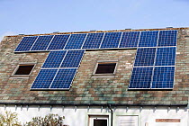 Solar panels n the Quaker Meeting House in Keswick, Lake District, UK. March 2012