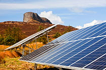 Solar panels on the Isle of Eigg which relies exclusively on renewable energy. Scotland, UK. May 2012