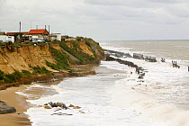 Happisburgh on the Norfolk Coast. This section of coast is the fastest eroding point in the UK and speeding up to to global warming induced sea level rise and increased stormy weather. August 2006