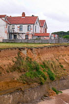 Happisburgh on the Norfolk Coast. This section of coast is the fastest eroding point in the UK and speeding up due to global warming induced sea level rise and increased stormy weather. August 2006