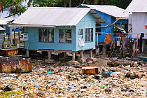 Plastic rubbish discarded in a lagoon on Funafuti Tuvalu. March 2007