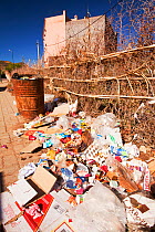 Rubbish on the streets of a town in the Atlas mountains, Morocco, North Africa. April 2012