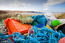 Plastic rubbish washed ashore from the sea in Glen Brittle, Isle of skye, Scotland, UK. May 2012