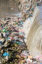 The Bishnumati river running through Kathmandu in Nepal. The river is full of litter and raw sewage which is emptied into the river. Nepal. December 2012