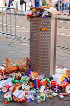Litter on the streets of Amsterdam following the annual Queen day celebrations, Netherlands. April 2013