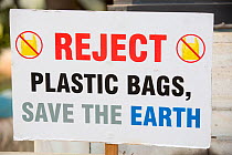 'Reject Plastic Bags, Save the Earth' sign banning plastic bags at the Victoria Memorial Hall in Calcutta, Bengal, India. December 2013