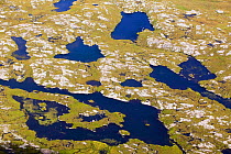 Flow country beneath Suilven, Sutherland, Scotland, UK. September 2006