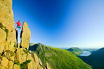 Man climbing on Great Gable in the Lake District, England, UK. July 2005