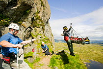 Injured climber with a dislocated shoulder is winched off Jacks Rake Pavey Ark by the Langdale Ambleside Mountain Rescue Team, Lake District, England, UK, August. August 2005